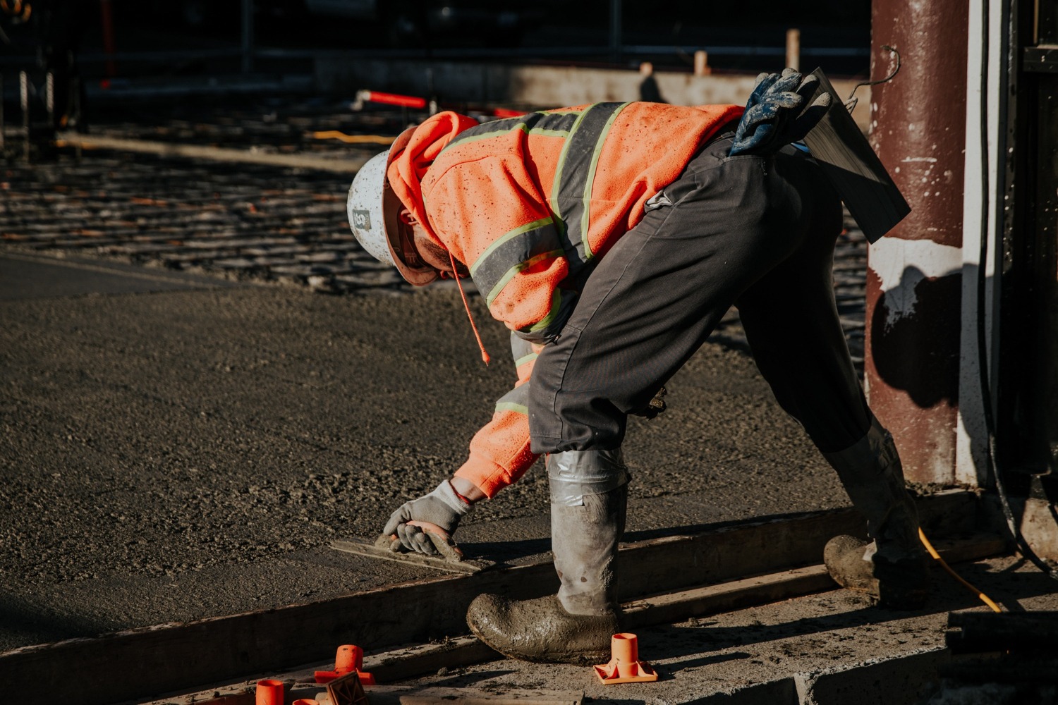 Fresh asphalt being smoothed · Chico